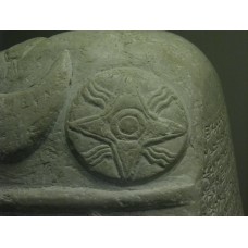 Babylonian boundary stone, cross with rays in a disc